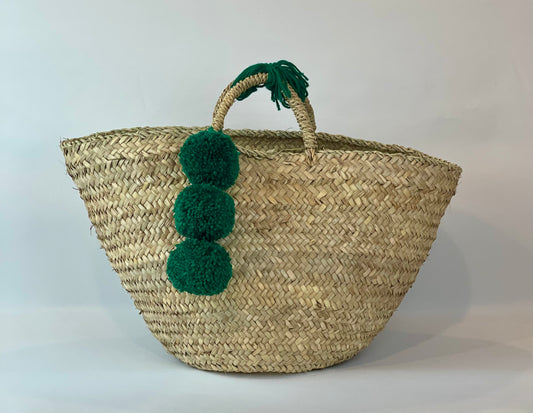 Basket with green pom pom