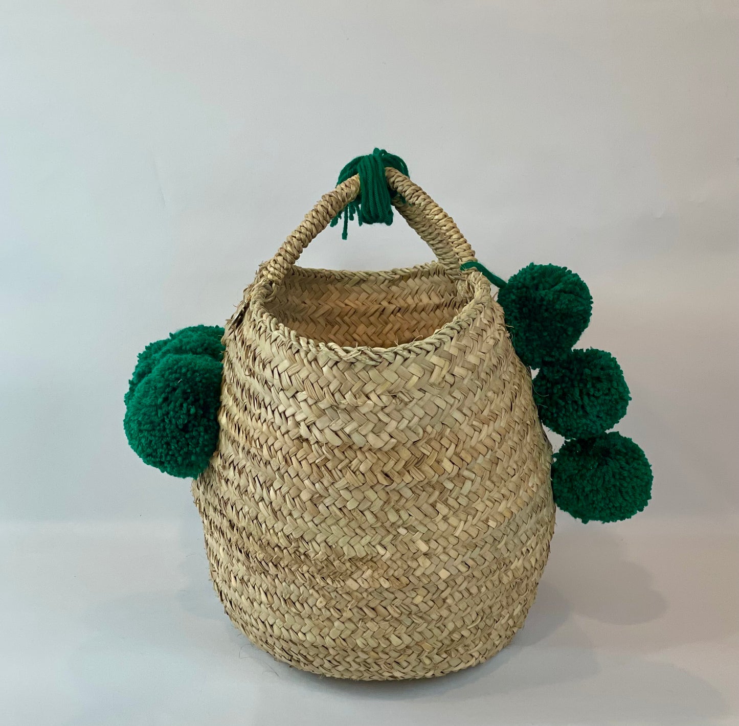 Coffa with two-tone green pom pom