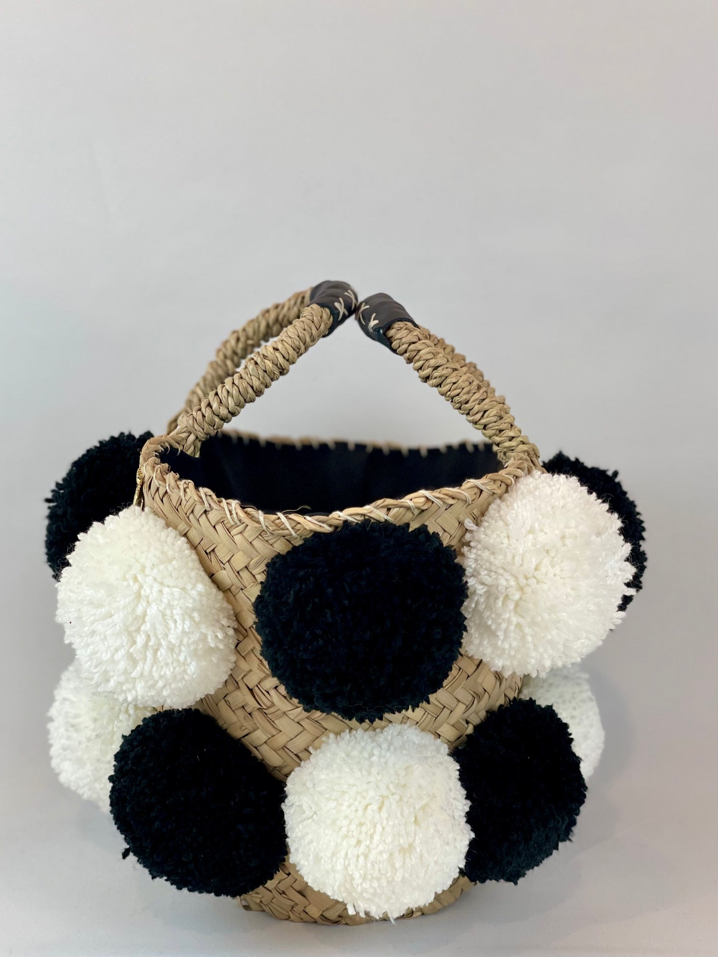 Handmade black and white pom pom basket