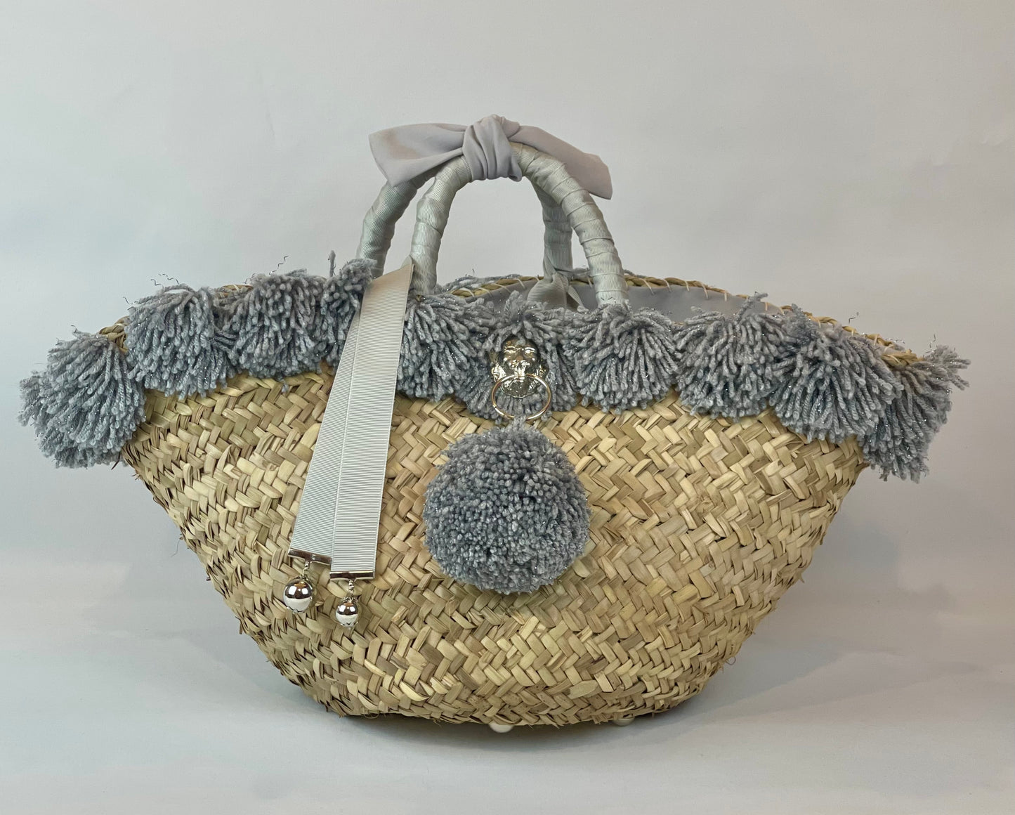 Basket with ceramic Maiden and silver pom pom