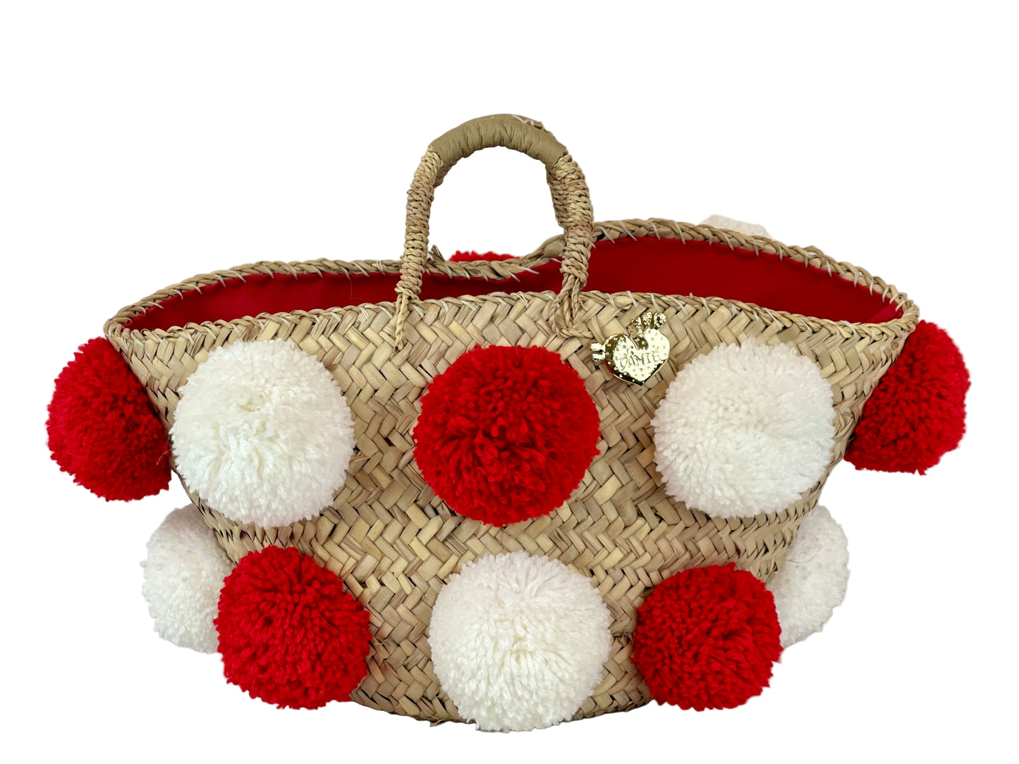 Basket with handmade white and red pom poms