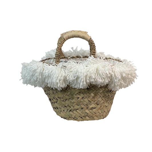 Basket with silver votive offering and white pom pom