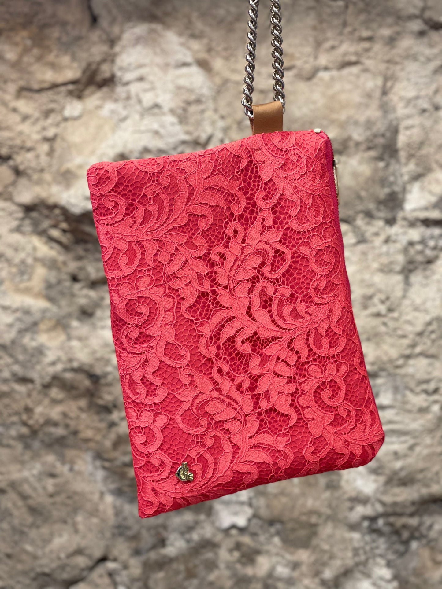 Coral pink lace clutch bag