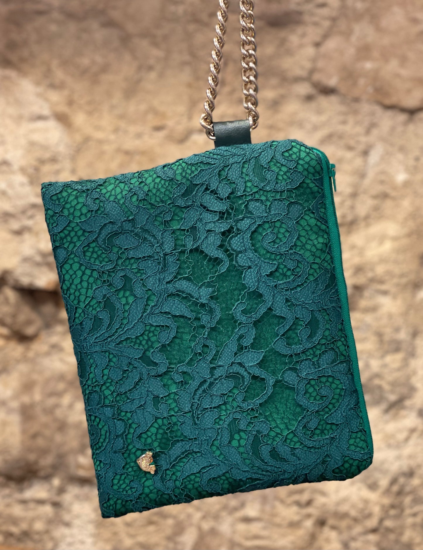 Dark green lace clutch bag