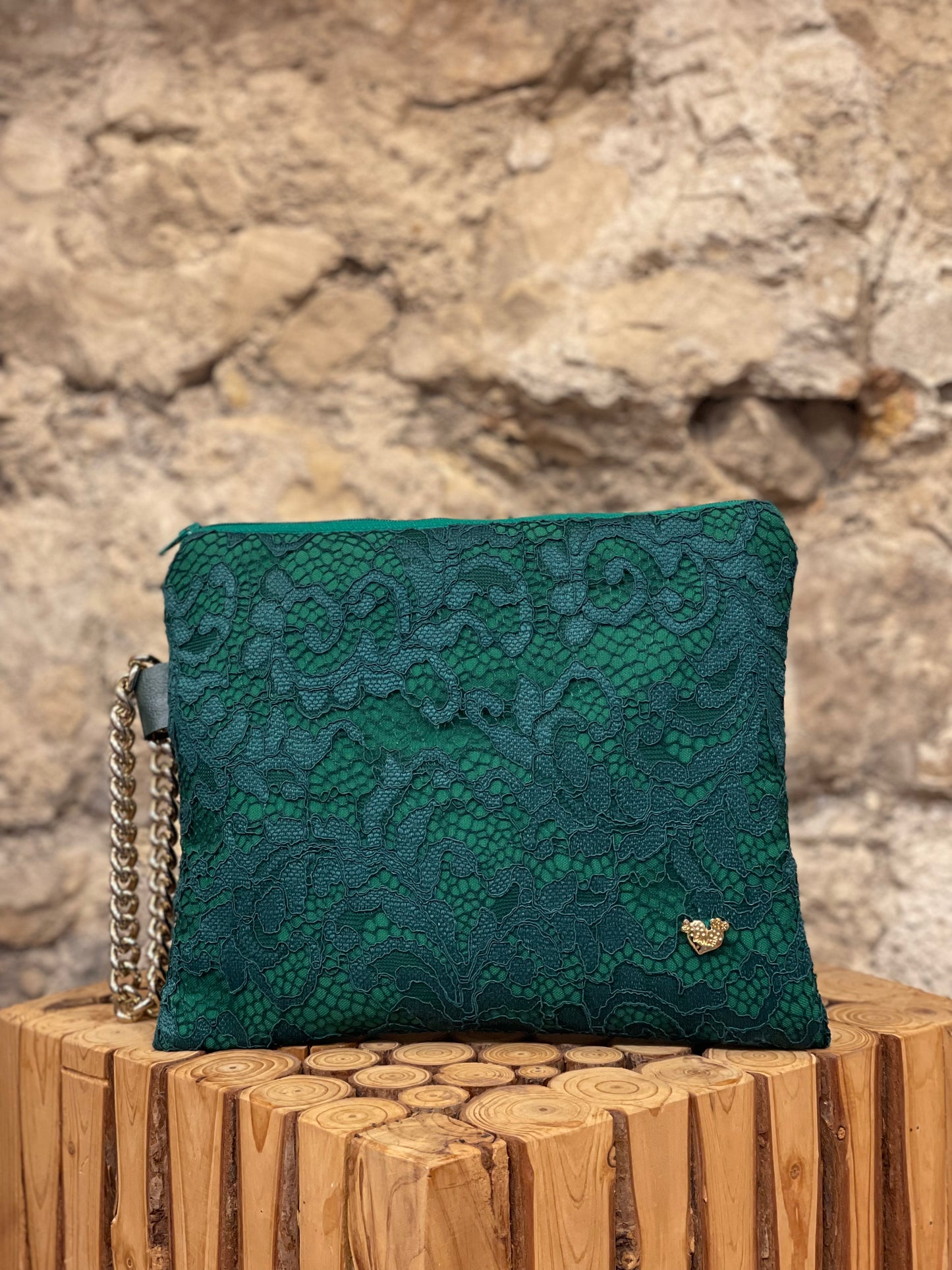 Dark green lace clutch bag