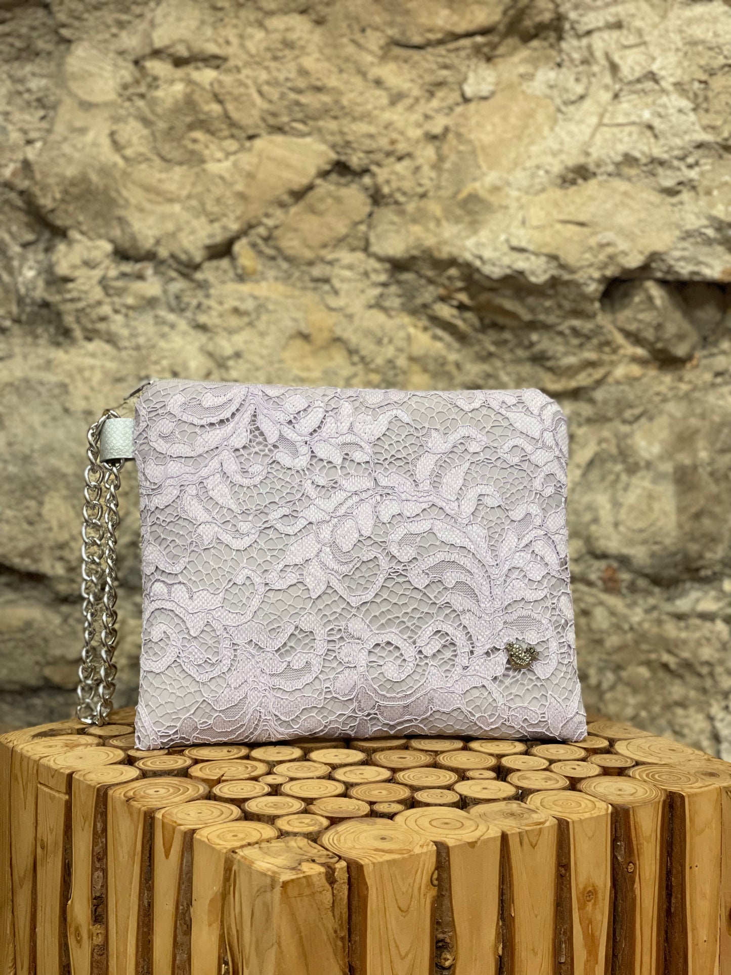 Lilac lace clutch bag