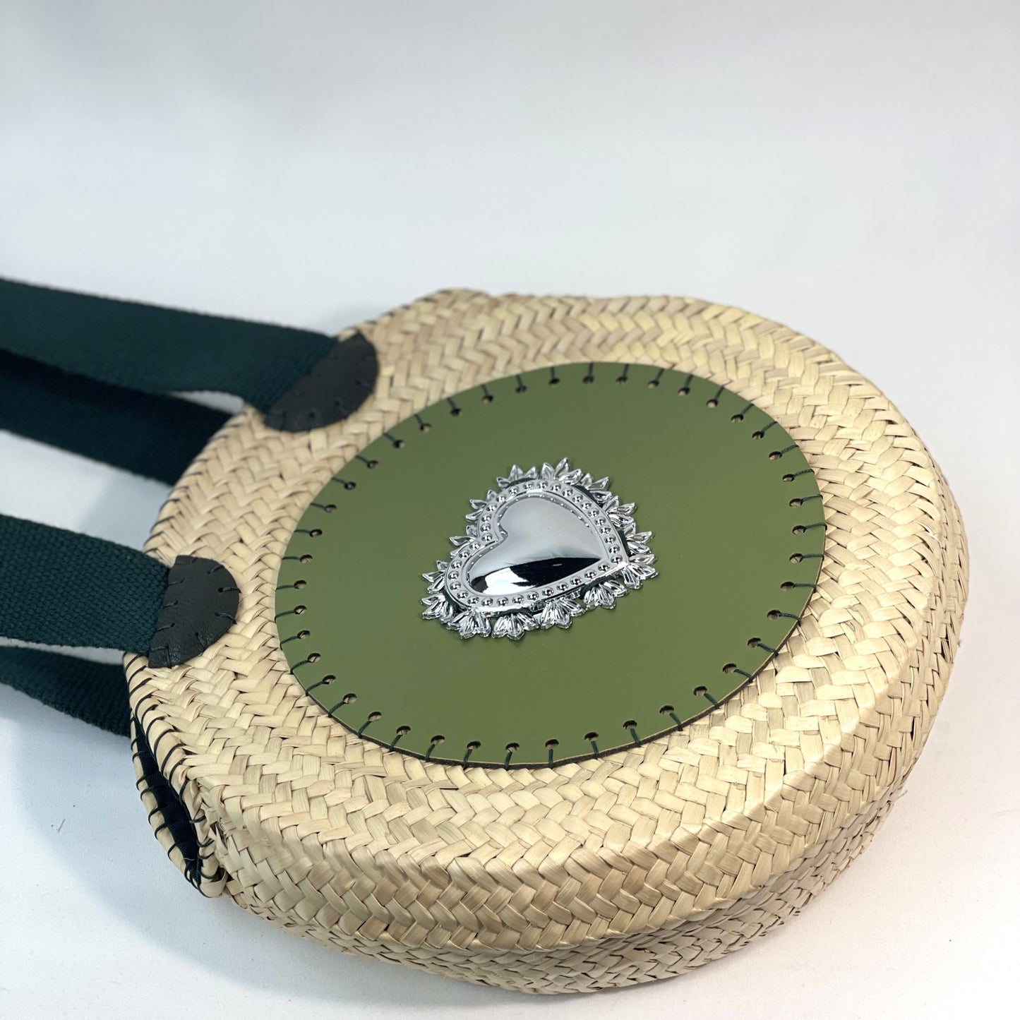 Borsa tonda con ecopelle verde ed ex voto argento