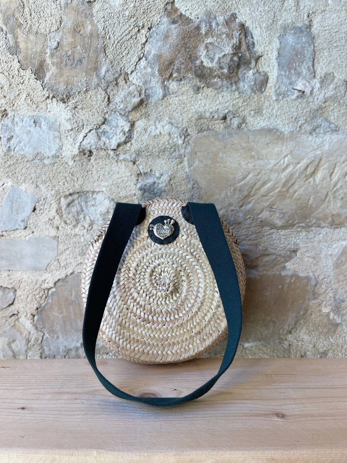 Borsa tonda con ecopelle verde ed ex voto argento