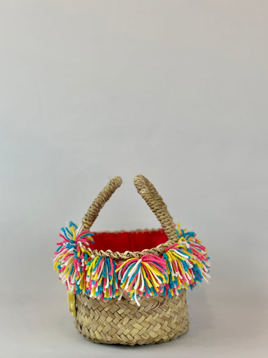 Basket with ceramic Tambourine and multicolored pom poms