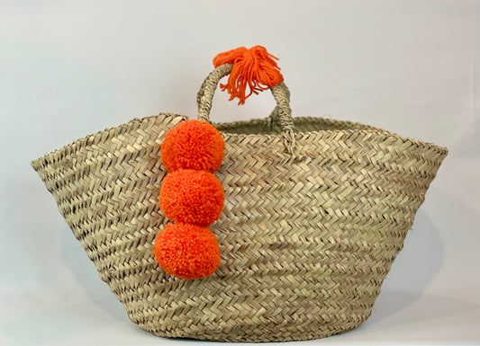Large basket with yellow and black pom pom