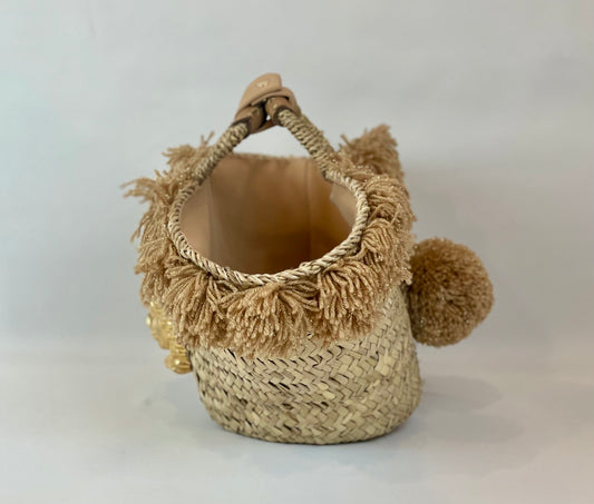Basket with ceramic Maiden and gold pom pom