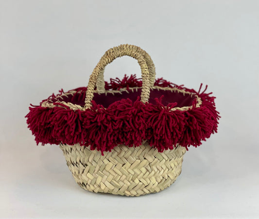 Basket with ceramic Maiden and fuchsia fringes