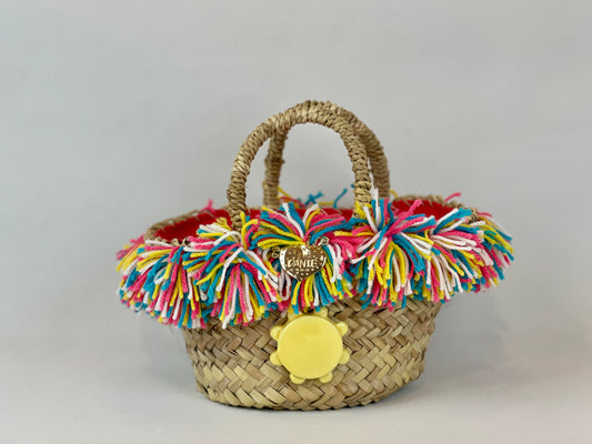 Basket with ceramic Tambourine and multicolored pom poms