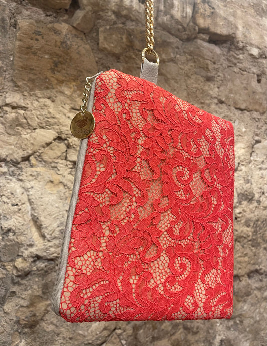 Coral pink lace clutch bag
