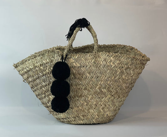 Basket with black pom pom 