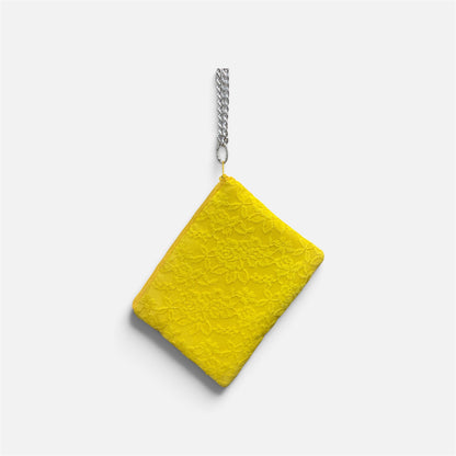 Pochette in pizzo gialla