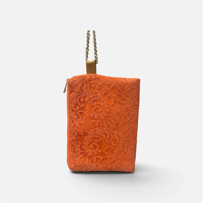 Orange lace clutch bag