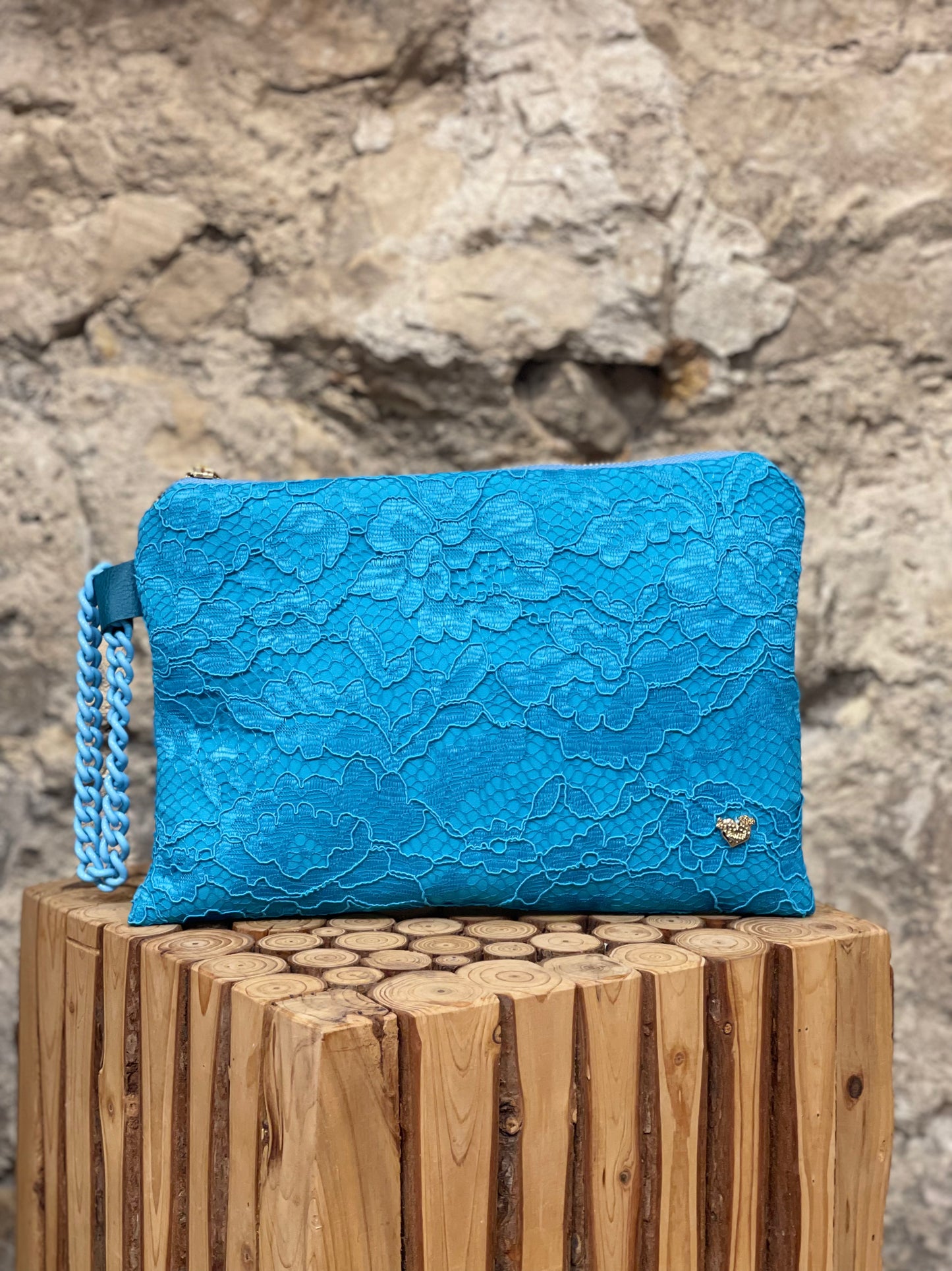 Pochette in pizzo turchese