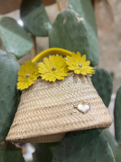 Borsa in palma con margherite gialle