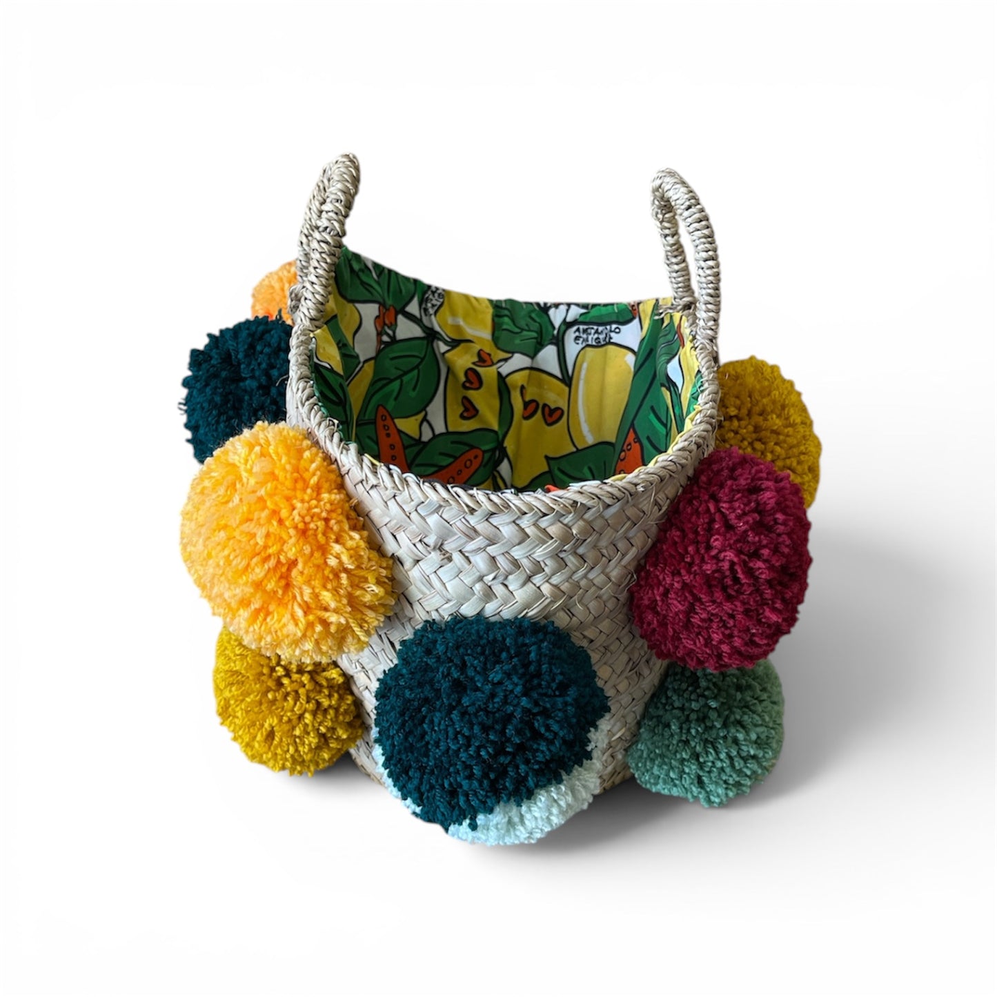 Basket with handmade white and red pom poms